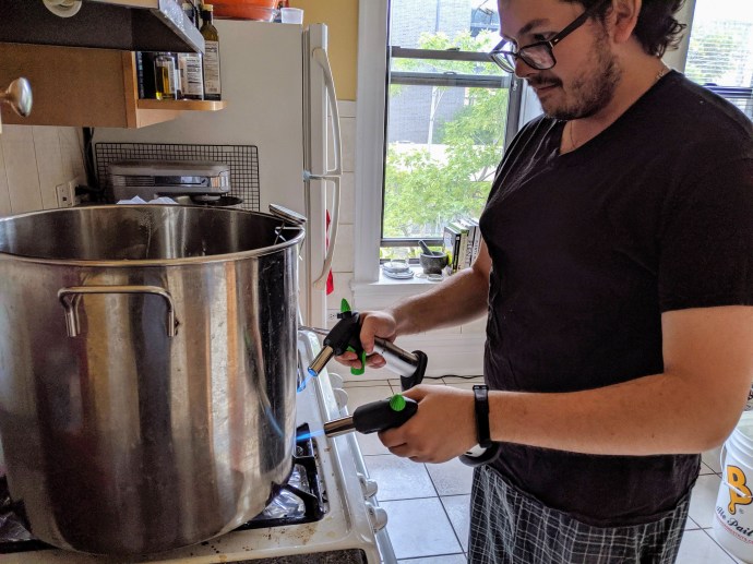 Two brulee torches, used to achieve a rolling boil